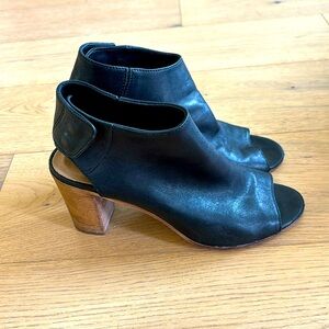 STEVEN Italian leather peep toe mules.